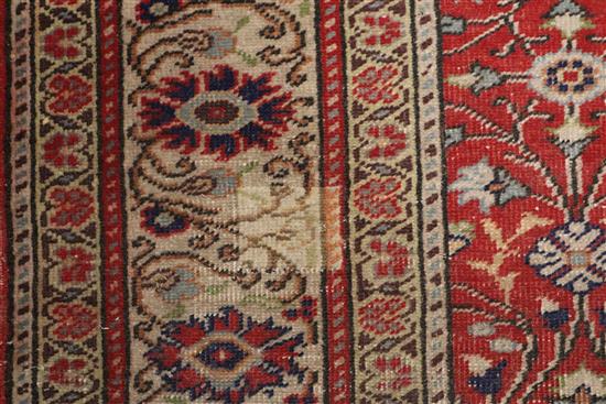 A Turkish Kayseri brick red rug 295 x 204cm